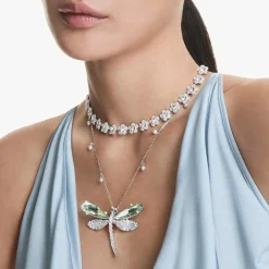 Ariana Grande x Swarovski pendant and brooch